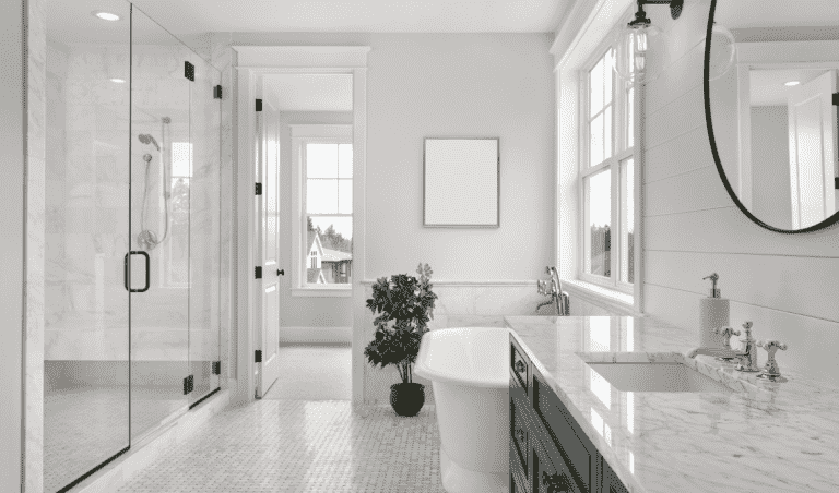 clean, sleek, well-lit white bathroom